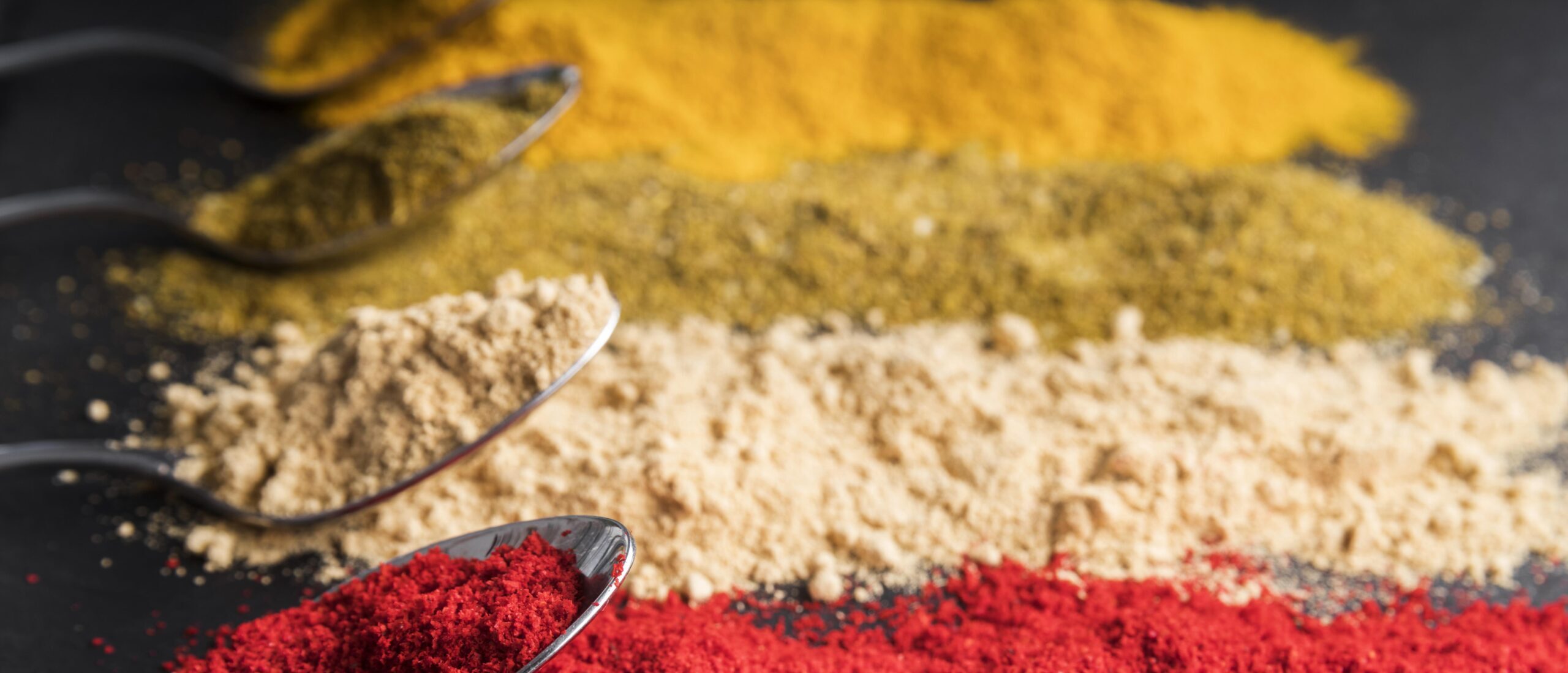 high-angle-spoons-with-colorful-powder